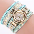 Mint green multi-layer wrap watch featuring heart charms and crystal diamond accents - Mint Green