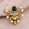 Golden spider brooch with skull body, black crystal, white pearls, and rhinestones - Gold Skull Spider Pearl (XD8167)
