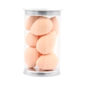 Macro detail of mini teardrop makeup sponges in a clear jar with a metallic silver lid - Set of 8 / Nude