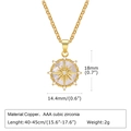 Detail showing gold copper sunburst pendant with white shell and AAA cubic zirconia stones - Mother of Pearl Star