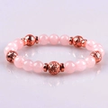 Pink zebra jasper and lava stone beaded stretch bracelet with rose gold metal accents - Rose Quartz and Rose Gold Lava Stone