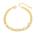Bracciale a catena cubana dorato con cinque ciondoli a cuore e zirconi bianchi - Bracciale