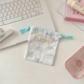 Detailed view of a small white canvas drawstring bag with a blue hand-drawn cat print - Printed Cat White