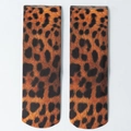 Flat lay of leopard print ankle socks showing detailed pattern and breathable fabric - Classic Leopard