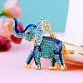 Blue crystal elephant keychain with gold-plated metal and sparkling rhinestones - Single OPP Bag Packaging / Striped Elephant Blue
