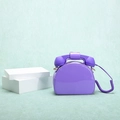 Detail of creative purple rotary phone handbag with glossy patent leather finish - Violet