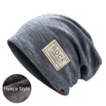 Close-up of blue-grey knit beanie featuring thick grey fleece lining and Rock patch - Fleece Lined Autumn Winter Style / Light Blue