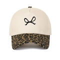 Close-up of leopard print brim and bow embroidery on 5-panel cotton baseball cap - Adjustable / Leopard Print