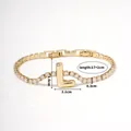 Gold letter L pendant bracelet with sparkling white zircons and adjustable lobster clasp - Letter L