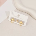 Golden stainless steel triangle stud earrings and zircon stone set on a white display card - Double Triangle Style / Gold