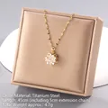 Golden titanium steel rotating flower necklace with zircon petals and a 45cm chain - Zirconia Floral Style (A1395)
