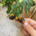 Detail of tortoiseshell hair clip featuring Barrette La France gold lettering on resin - Dark Tortoiseshell