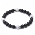 Close-up of 8mm black lava stone bracelet with white marble beads and silver spacers - White Turquoise and Matte Stone