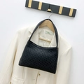 Chic black woven underarm bag featuring a sophisticated textured checkered pattern - Black