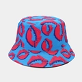 Detailed close-up of blue reversible bucket hat with vibrant red lip print pattern - M (56-58cm) / Blue Lip Print