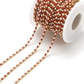 DIY jewelry chain featuring red rhinestones and white pearls set in a gold metal finish - 2.5mm Red