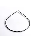 Minimalist black twisted headband with textured weave pattern on white background - Twist Style 1pc