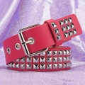 Detail of pink punk belt with three rows of silver square pyramid rivets and metal buckle - Rose Red