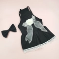 Detailed view of a black floral pet dress with lace edges and a matching bow tie - XS / Chanel Style Black Formal Gown with Headpiece