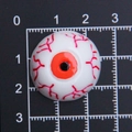 Vue détaillée d'un accessoire d'Halloween en résine de 2,2 cm avec veines rouges et iris orange - Diamètre 2.5cm / Grand Orange
