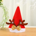 Bonnet de Noël rouge festif avec bois de renne et nœud doré sur une table en bois. - Bois Marron Café / Adulte