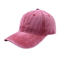 Detail of burgundy washed cotton baseball cap showing vintage texture and stitching - Burgundy