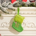 Green knit Christmas stocking with golden glitter letter H and plush cuff decoration - Letter H