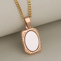 Colgante rectangular minimalista en oro rosa con incrustación ovalada blanca - Oro rosa