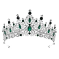Close-up of green crystal emeralds and sparkling diamonds on a silver bridal tiara - Silver & Green Crystal