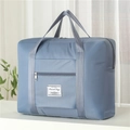 Large grey-blue nylon travel storage bag with waterproof fabric and carry handles - Blue