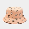 Close-up of beige cotton bucket hat featuring cute calico cat prints and logo tag - Pink