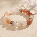 Detailed macro of multi-color crystal beads bracelet with silver hollow spacers - 14# Natural Red Hematoid Quartz Rutilated Bracelet