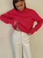 Detail showing fuchsia high neck knit texture and white glossy leather pants on model - S / Red
