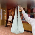 Minimalist mint green canvas tote bag with knot handle design in a natural street style - Mint Green