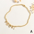 Collar de cadena de bolas dorada con dijes de luna, ojo turco, corazón, estrella y perla - Estilo A-Luna Ojo del Diablo Estrella