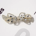 Elegant gold butterfly hair clip with white crystals and pearls on white background - Luan Si Ivory White