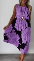 Sleeveless maxi dress in purple and black floral print featuring a loose fit silhouette - Purple
