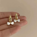 Elegante goldene Schleifenohrringe mit funkelnden Zirkonia-Kristallen für Damen - Knoten-Zirkonia-Schleife