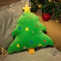 Green plush Christmas tree shaped pillow with colorful embroidery on a gray sofa - Pentagram Green Tree