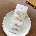 Set of 4 cream lace floral and bow hair clips on display for toddlers and girls - Flower Pearl Bow Clip
