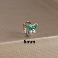Macro shot of 6mm silver butterfly cartilage hoop with green and white gemstones - 6mm / Silver-Green