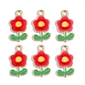 Detail view of six red rose alloy charms with gold edging for DIY jewelry making - Hollow Out Flower Charm