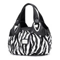 Detailed view of zebra print handbag with black handles and silver fashion metal plaque - Zebra Print
