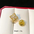 Close-up of golden flower brooch with four marquise zircons and butterfly pin back - Rotatable Gold Clover C215