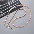 Pink leather woven chain strap with pearls and camellia charms for handbags - Crossbody Chain / Pink