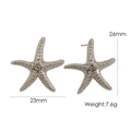 Silver starfish stud earrings with sparkling crystals and textured beads 23mm size - Steel Color / White Zirconia