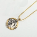 Gold twist chain necklace featuring a Medusa relief pendant with white zircon stones - Bamboo Style