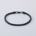 Detailansicht des schwarzen Edelstahl-Weizenkettenarmbands mit dichter gewebter Textur - 3mm*19.5cm / Schwarz