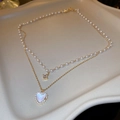 Élégant collier double épaisseur doré avec pendentif cœur et perles blanches - Style Coquillage Cœur Blanc Double Couche