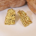 Detailed macro view of gold-plated irregular lava texture stainless steel earrings - Gold Irregular Lava Style (FYD6172)